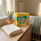 Pampers Swaddlers diapers styled in a cozy nursery — soft, leak-proof baby diapers